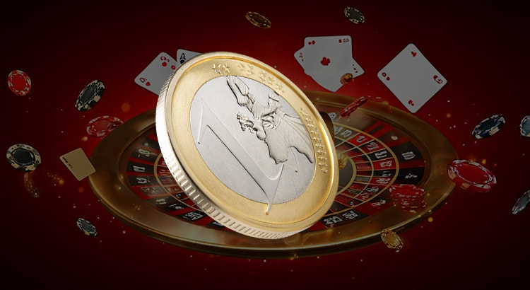 Eine 1-Euro-Münze liegt auf einem Smartphone mit einer Casino-App.
