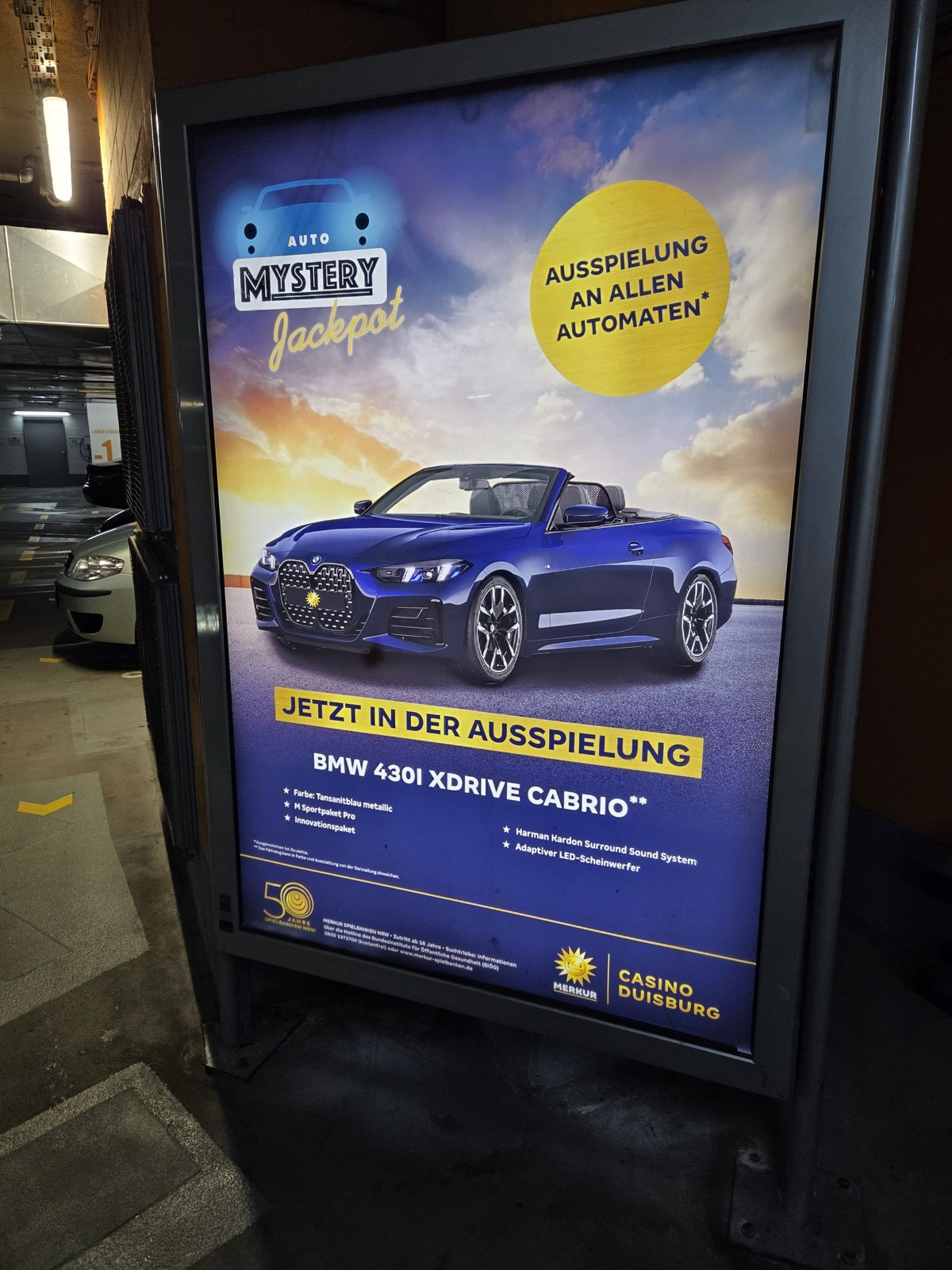 Plakat zum Auto Mystery Jackpot des Casino Duisburg mit BMW 430i xDrive Cabrio