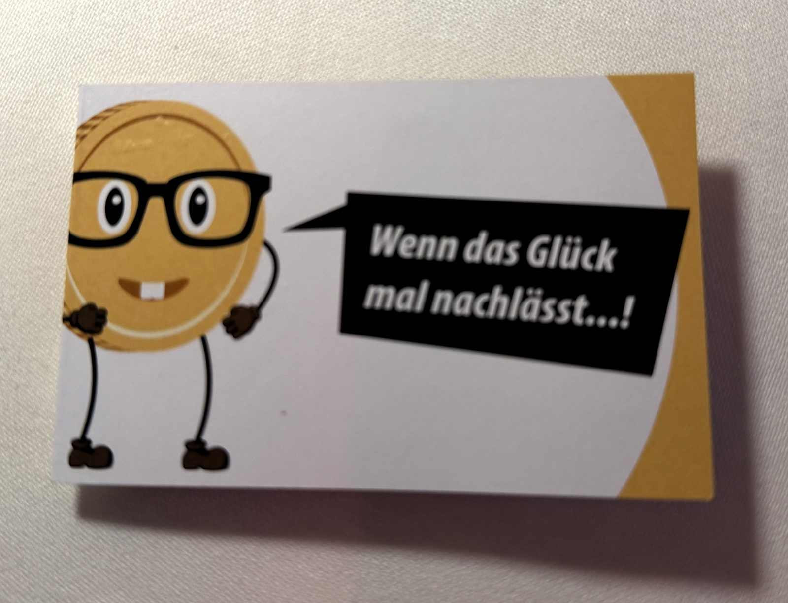Infokärtchen zum Thema Glücksspielsucht im Casino am Potsdamer Platz
